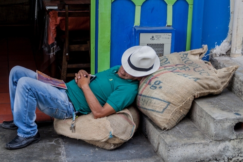 Salento,,Colombia,-,September,8,,2015:,Worker,Sleeps,On,Bags